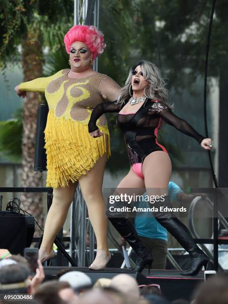 Drag queens Eureka! and Morgan McMichaels attend the LA Pride ResistMarch on June 11, 2017 in West Hollywood, California.