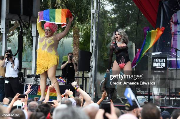 Drag queens Eureka! and Morgan McMichaels attend the LA Pride ResistMarch on June 11, 2017 in West Hollywood, California.