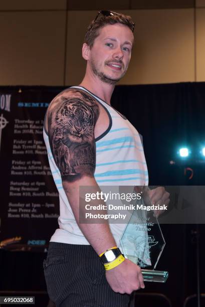 Winner of the most realistic tattoo during day three of the "19th Annual Northern Ink Xposure Tattoo Convention" at the Metro Toronto Convention...