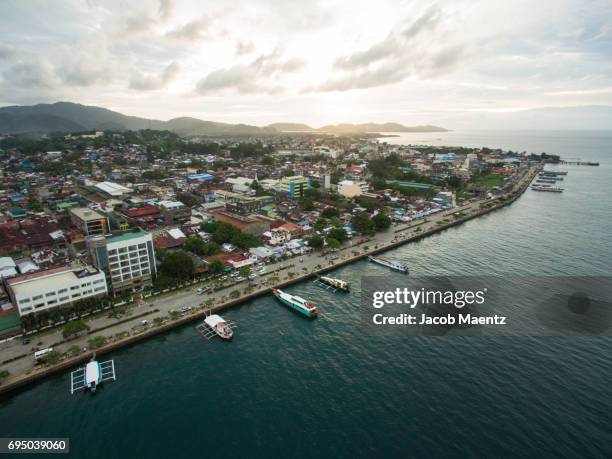 aerial of surigao city, mindanao, philippines. - philippines stockfoto's en -beelden