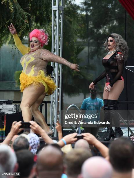 Drag queens Eureka! and Morgan McMichaels attend the LA Pride ResistMarch on June 11, 2017 in West Hollywood, California.