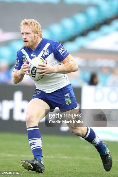 James Graham of the Bulldogs runs the ball during the round 14 NRL match between the Canterbury Bulldogs and the St George Illawarra Dragons at ANZ...