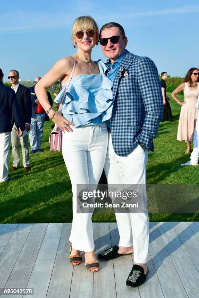 Svitlana Flom and Gary Flom attend The 17th Annual Midsummer Night Drinks Benefiting God's Love We Deliver at Private Residence on June 10, 2017 in...