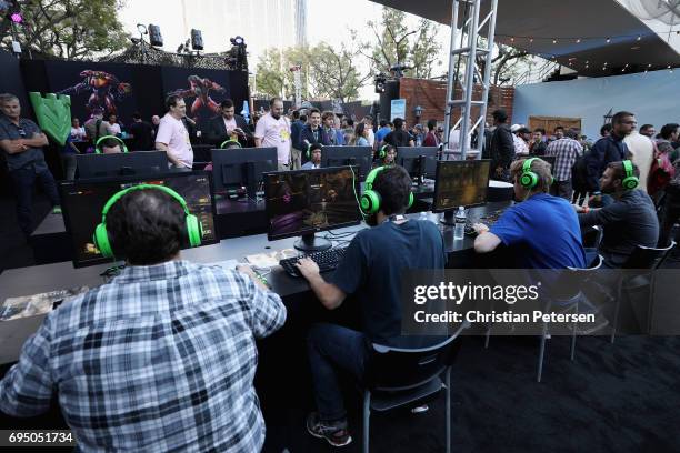 Gamers compete in 'Quake' as they attend the Bethesda E3 conference at the LA Center Studios on June 11, 2017 in Los Angeles, California. The E3 Game...