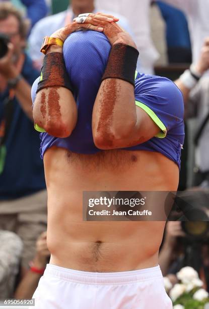 Rafael Nadal of Spain celebrates winning his 10th title at the French Open following the men's final on day 15 of the 2017 French Open, second Grand...