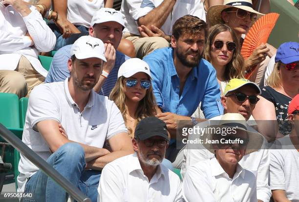 Pau Gasol and his girlfriend Catherine McDonnell, Fernando Llorente and his wife Maria Llorente attend Rafael Nadal's victory during the men's final...