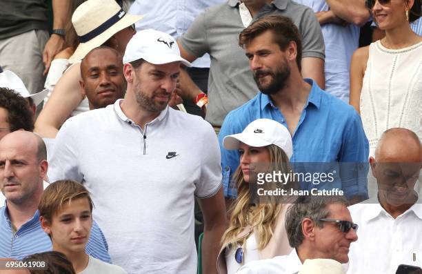 Pau Gasol and his girlfriend Catherine McDonnell, Fernando Llorente attend Rafael Nadal's victory during the men's final on day 15 of the 2017 French...