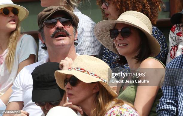 Jean Dujardin and Nathalie Pechalat attend the men's final on day 15 of the 2017 French Open, second Grand Slam of the season at Roland Garros...