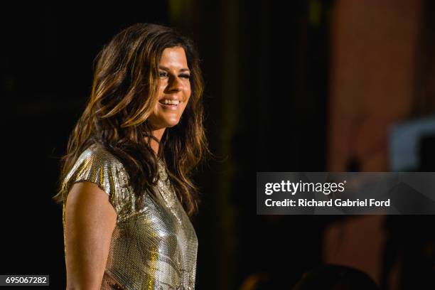 Singer Karen Fairchild of Little Big Town performs at Nissan Stadium during day 4 of the 2017 CMA Music Festival on June 11, 2017 in Nashville,...