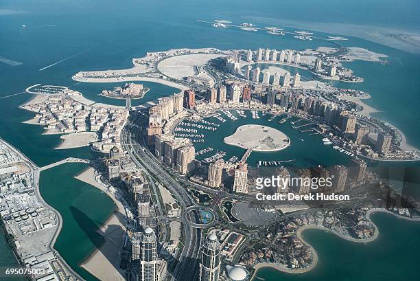 View of the artificial island known as The Pearl that spans nearly 4 million square meters jutting out from the city of Doha, 350 metres offshore of...