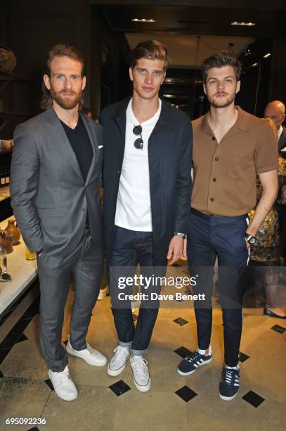 Craig McGinlay, Toby Huntington-Whiteley and Jim Chapman attend a breakfast hosted by Christopher Bailey, Dame Natalie Massenet and Dylan Jones in...