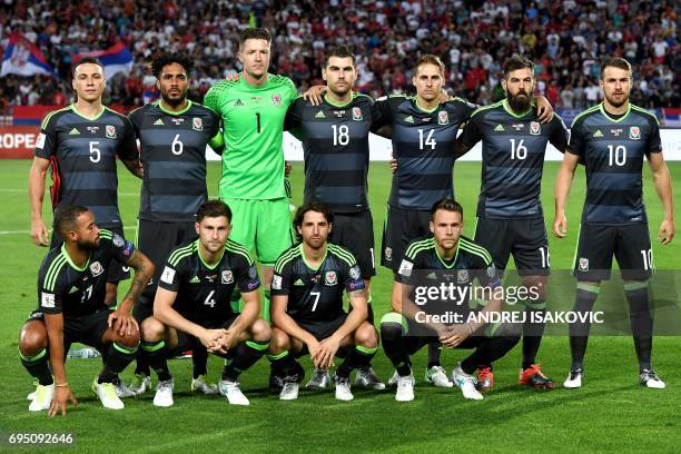 Wales' players pose for a team photo ahead of the WC 2018 football qualification match between Serbia and Wales in Belgrade on June 11, 2017:...