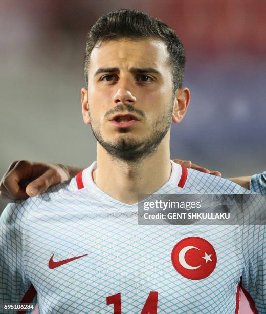 Turkey's Oguzhan Ozyakup looks on prior the FIFA World Cup 2018 qualification football match between Kosovo and Turkey in Loro Borici stadium in the...