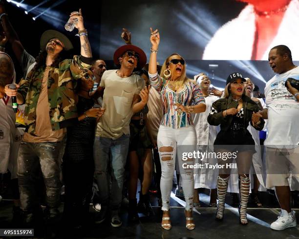 Bizzy Bone, Faith Evans, Lil Kim, and Un Rivera perform during the 2017 Hot 97 Summer Jam at MetLife Stadium on June 11, 2017 in East Rutherford, New...