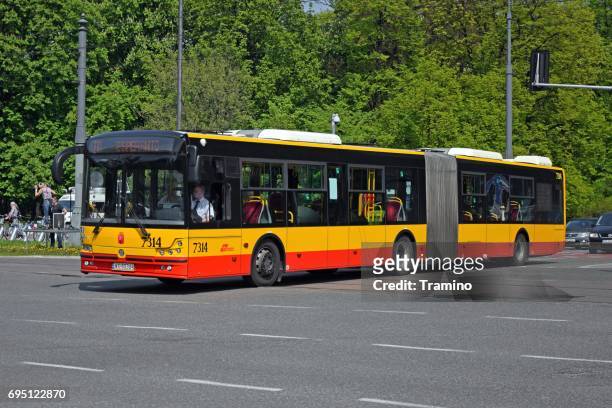 lng bus on the street - warsaw bus stock pictures, royalty-free photos & images