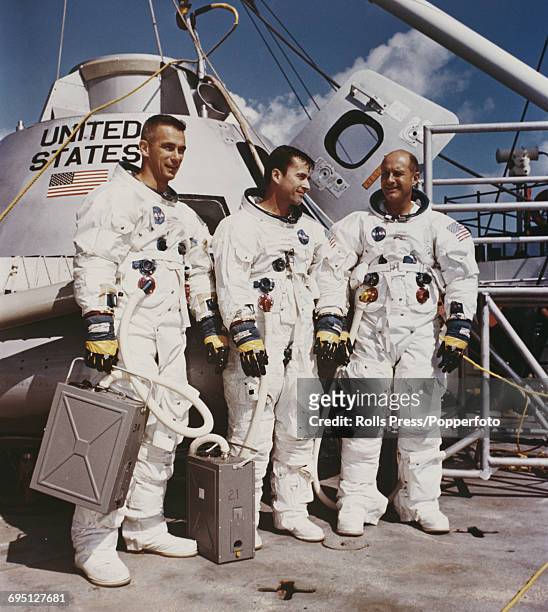 American astronauts and crew of the Apollo 10 mission, from left, Lunar Module pilot Eugene Cernan , Command Module pilot John Young and Commander...