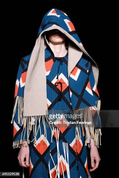 Model walks the runway at the Craig Green show during the London Fashion Week Men's June 2017 collections on June 12, 2017 in London, England.