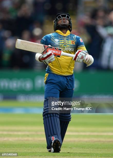 Kusal Mendis of Sri Lanka walks off after being dismissed during the ICC Champions Trophy match between Sri Lanka and Pakistan at SWALEC Stadium on...