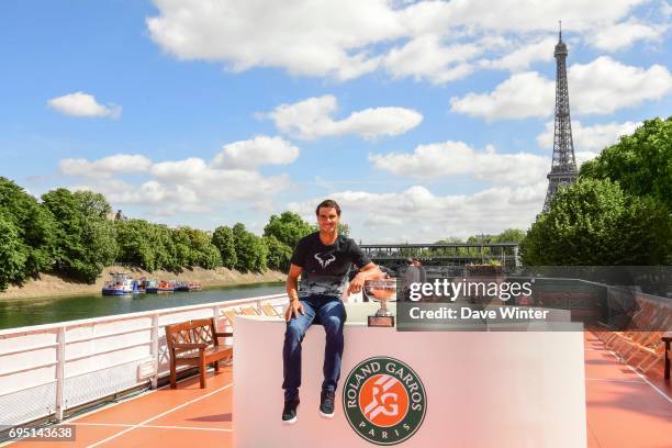 Rafael Nadal of Spain poses during a photocall to celebrate his record breaking 10th French Open title at Quai de Grenelle on June 12, 2017 in Paris,...