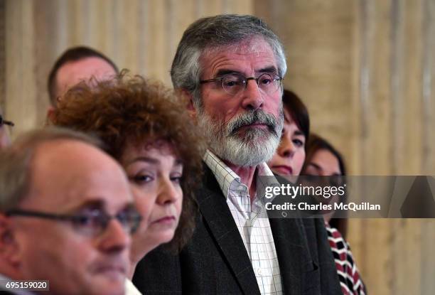 Sinn Fein president Gerry Adams holds a press conference alongside party members at Stormont as the Stormont assembly power sharing negotiations...
