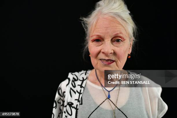 British designer Vivienne Westwood poses for a photograph ahead of a catwalk show of her latest creations at London Fashion Week Men's June 2017 in...