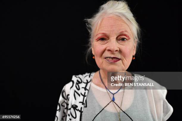 British designer Vivienne Westwood poses for a photograph ahead of a catwalk show of her latest creations at London Fashion Week Men's June 2017 in...