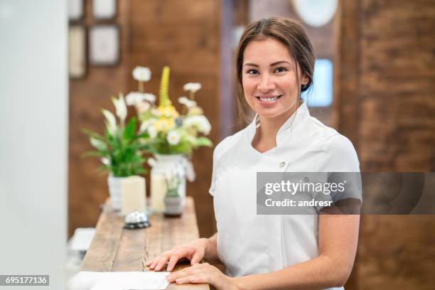 portrait of a woman working at a spa - beautician stock pictures, royalty-free photos & images