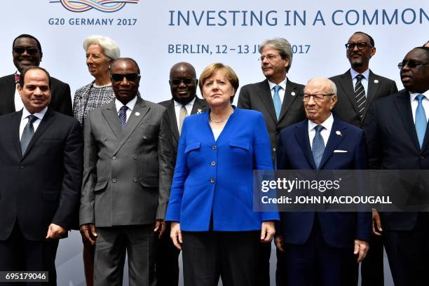 Egyptian President Abdel Fattah al-Sisi, Guinean President and Chairman of the African Union Alpha Conde, German Chancellor Angela Merkel, Tunesian...