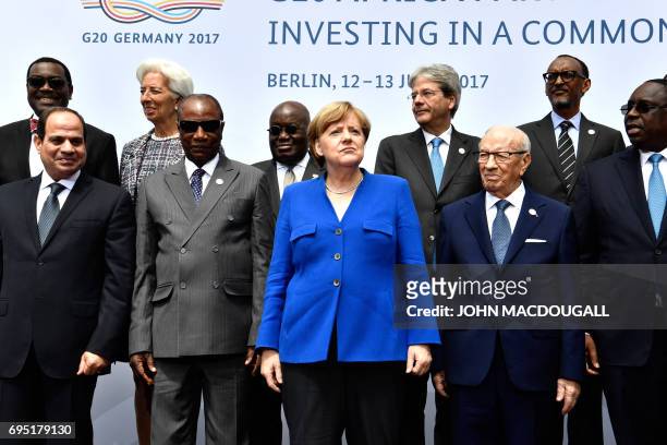 Egyptian President Abdel Fattah al-Sisi, Guinean President and Chairman of the African Union Alpha Conde, German Chancellor Angela Merkel, Tunesian...