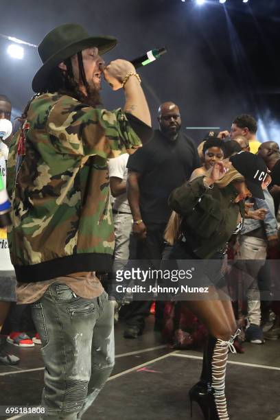 Bizzy Bone and Lil KIm perform at the 2017 Hot 97 Summer Jam at MetLife Stadium on June 11, 2017 in East Rutherford, New Jersey.