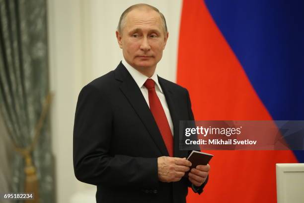 Russian President Vladimir Putin arrives to give a speech during his meeting with children at the Kremlin on June 12, 2017 in Moscow, Russia. Russian...