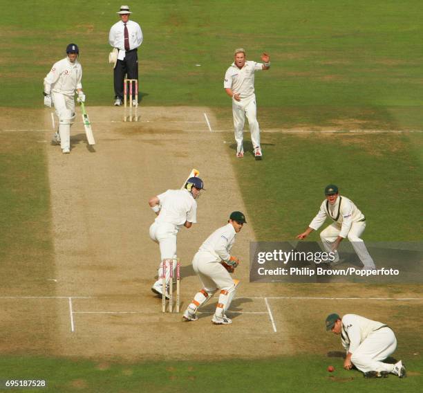 Matthew Hayden of Australia drops Michael Vaughan of England during the 3rd Ashes Test match between Australia and England at Old Trafford in...