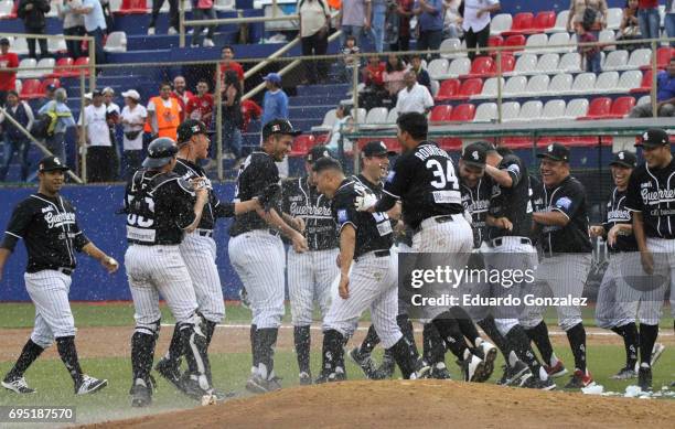 Players of Guerreros de Oaxaca celebrate after the match between Piratas de Campeche and Guerreros de Oaxaca as part of the Liga Mexicana de Beisbol...