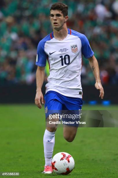 Christian Pulisic of United States drives the ball during the match between Mexico and The United States as part of the FIFA 2018 World Cup...