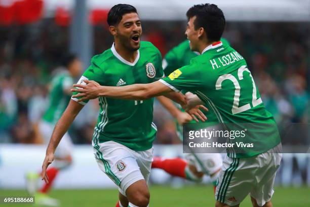 Carlos Vela of Mexico celebrates with teammates after during the match between Mexico and The United States as part of the FIFA 2018 World Cup...