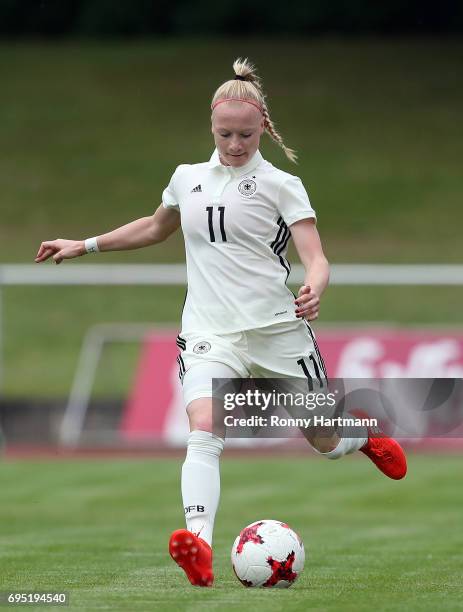 Anna Gerhardt of Germany runs with the ball during the U19 women's elite round match between Germany and Switzerland at Friedensstadion on June 9,...