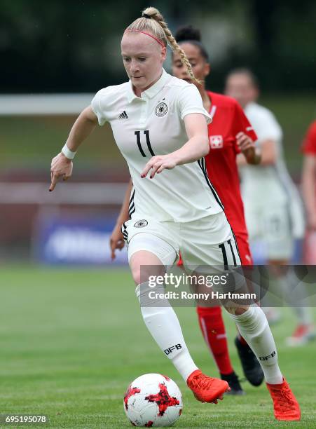 Anna Gerhardt of Germany runs with the ball during the U19 women's elite round match between Germany and Switzerland at Friedensstadion on June 9,...