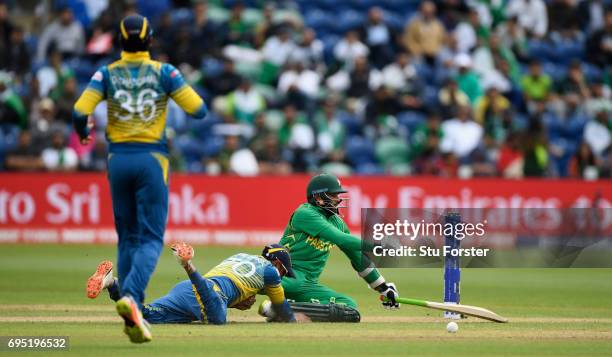 Pakistan batsman Azhar Ali clashes with Dhanushka Gunathilleke of Sri Lanka whilst going for a quick single during the ICC Champions League match...