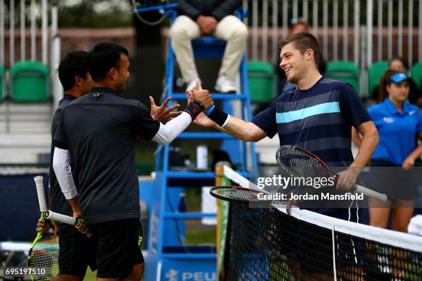 Ken Supski and Neal Skupski of Great Britain celebrates victory in their Men's Doubles first round match against Sanchai Ratiwatana and Sonchat...