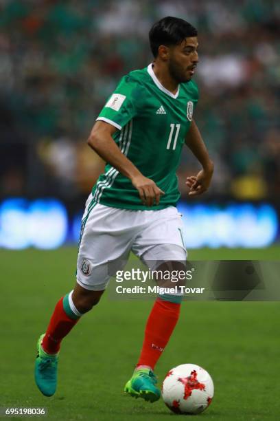 Carlos Vela of Mexico drives the ball during the match between Mexico and The United States as part of the FIFA 2018 World Cup Qualifiers at Azteca...