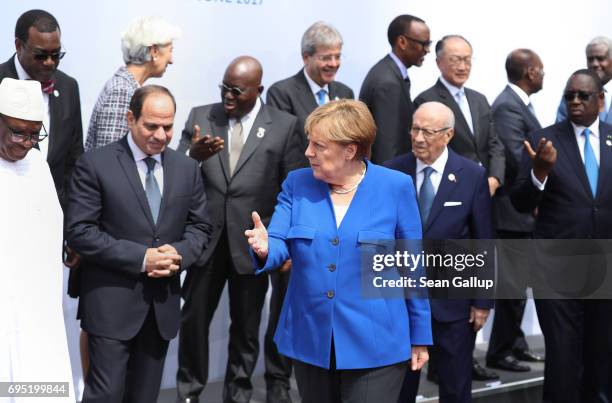 German Chancellor Angela Merkel and other participants of the G20 Africa Conference, including Egyptian President Abd El-Fattah El-Sisi and Tunisian...