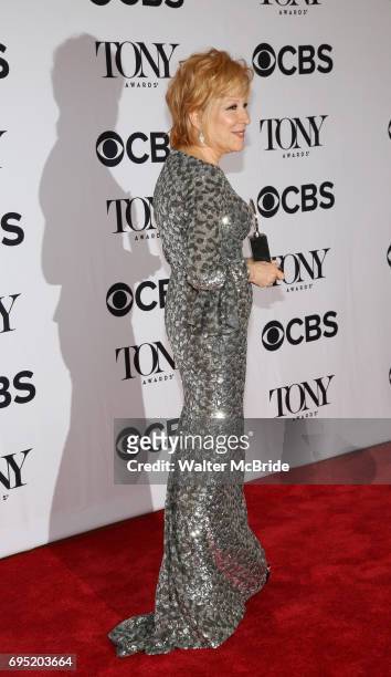 Bette Midler poses at the 71st Annual Tony Awards, in the press room at Radio City Music Hall on June 11, 2017 in New York City.