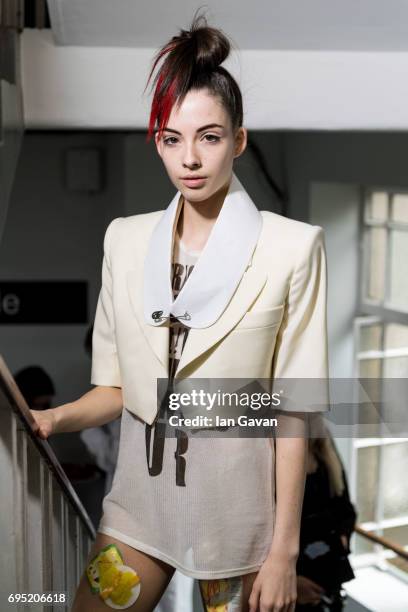 Model backstage ahead of the Vivenne Westwood show during the London Fashion Week Men's June 2017 collections on June 12, 2017 in London, England.