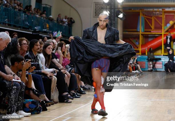 Model walks the runway at the Vivenne Westwood show during the London Fashion Week Men's June 2017 collections on June 12, 2017 in London, England.