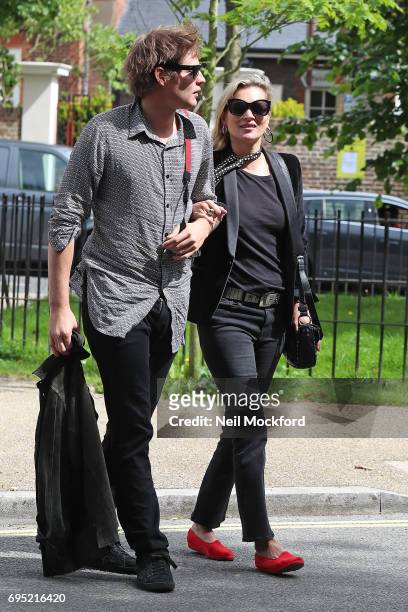Kate Moss and her boyfriend Count Nikolai von Bismarck seen visiting The Flask Pub in Highgate on June 12, 2017 in London, England.