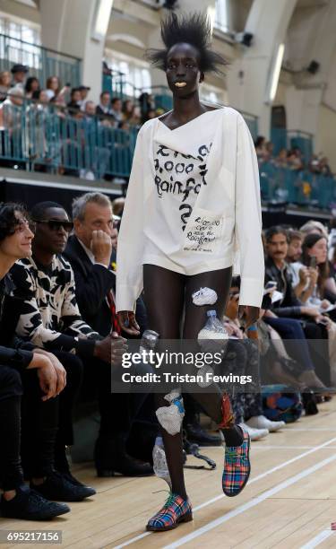 Model walks the runway at the Vivenne Westwood show during the London Fashion Week Men's June 2017 collections on June 12, 2017 in London, England.