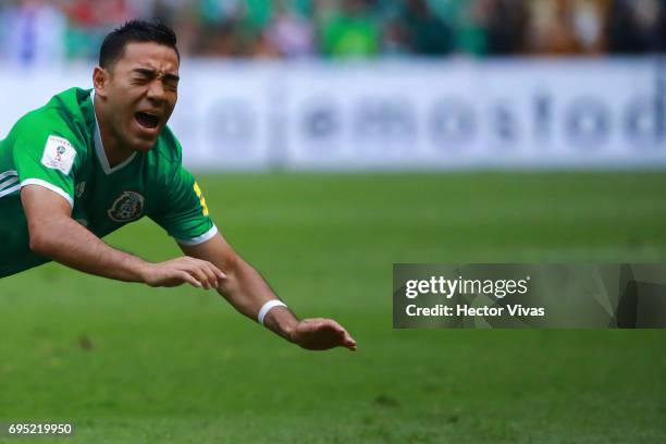 Marco Fabian of Mexico receives a foul during the match between Mexico and The United States as part of the FIFA 2018 World Cup Qualifiers at Azteca...