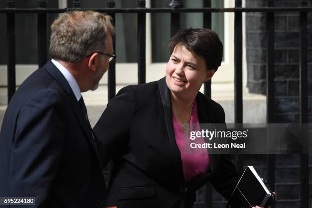 David Mundell, U.K. Scottish secretary and Leader of the Scottish Conservatives Ruth Davidson leave 10 Downing Street on June 12, 2017 in London,...