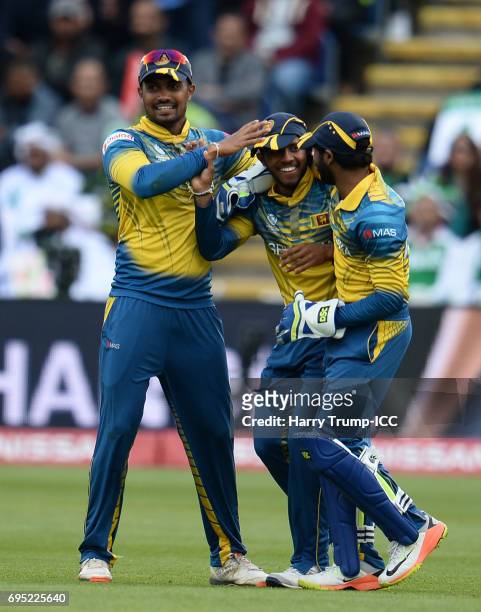 Kusal Mendis of Sri Lanka celebrates after catching Azhar Ali of Pakistan during the ICC Champions Trophy match between Sri Lanka and Pakistan at...