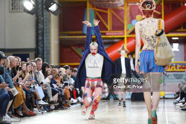 Model walks the runway at the Vivenne Westwood show during the London Fashion Week Men's June 2017 collections on June 12, 2017 in London, England.